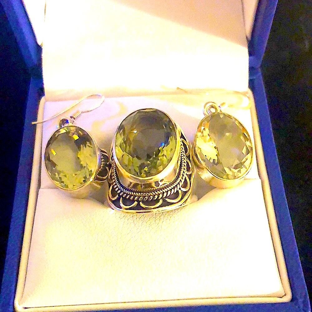 Silver set earrings and large ring with white amethyst